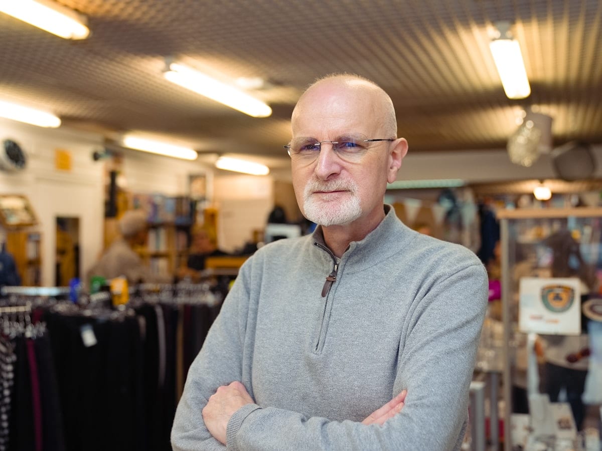 An independent retailer in his own shop